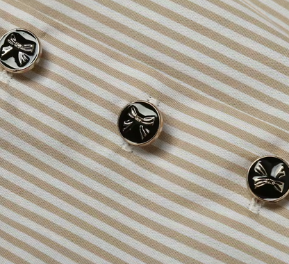 Riah - elegantes dirndlkleid mit knopfleiste und schleifenband